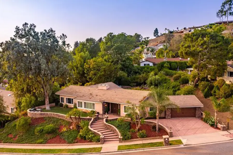 Single family home along hillside.