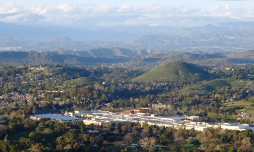 Vista of City of Thousand Oaks with hills and Mountains in view.